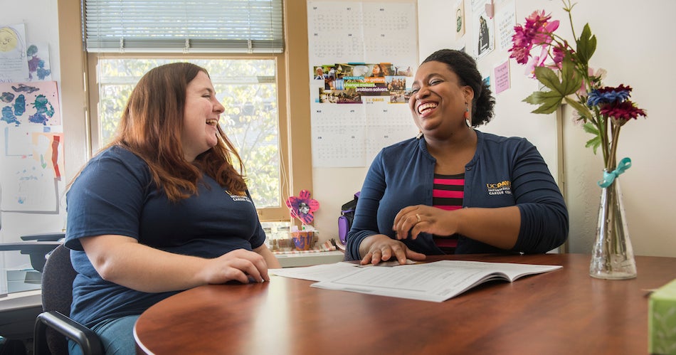  Ashley Jess, a Forensics Graduate Student chats with career advisor Marjannie Akintunde, in her office in South Hall. Akintunde earned her PhD from UC Davis and now works as a career advisor for master's, Ph.D. and postdoctoral scholars. (Karin Higgins/UC Davis)