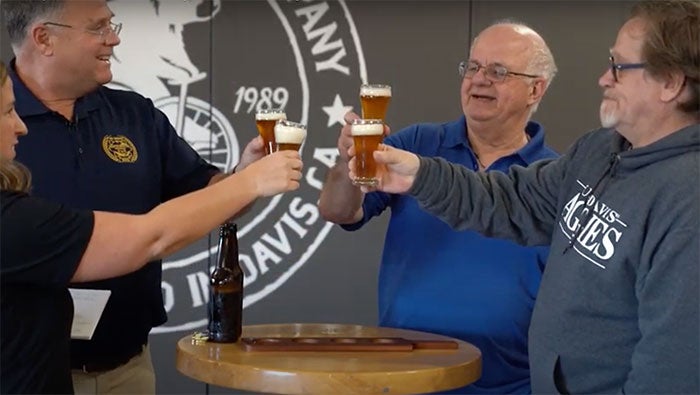 Left to right: Gina Reed, of UC Davis Continuing and Professional Education; Harlan Coomes, Master Brewers Certificate Program graduate; Charlie Bamforth, distinguished professor emeritus in the Department of Food Science and Technology; and Glen Fox, Anheuser-Busch endowed professor of malting and brewing sciences