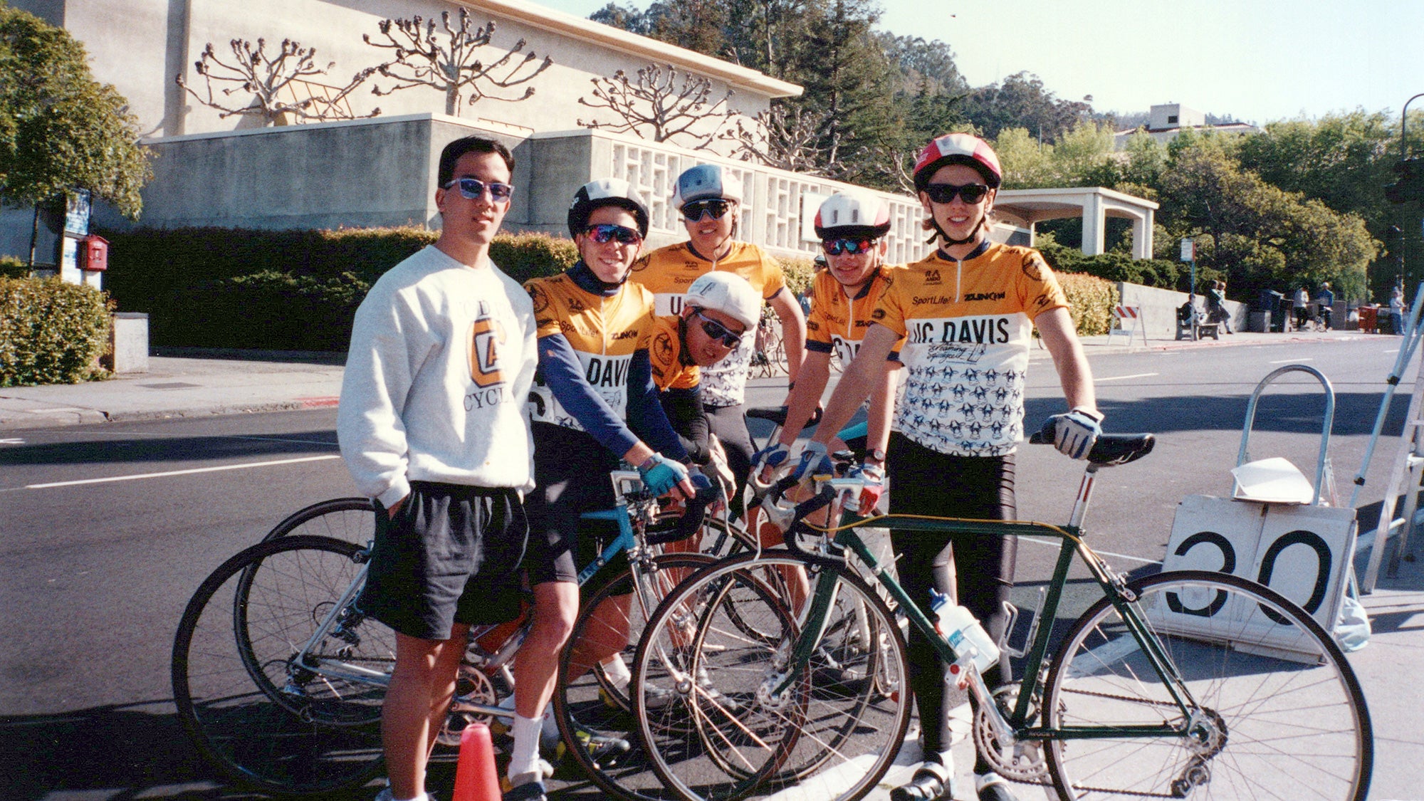 Biking team poses with their bicycles