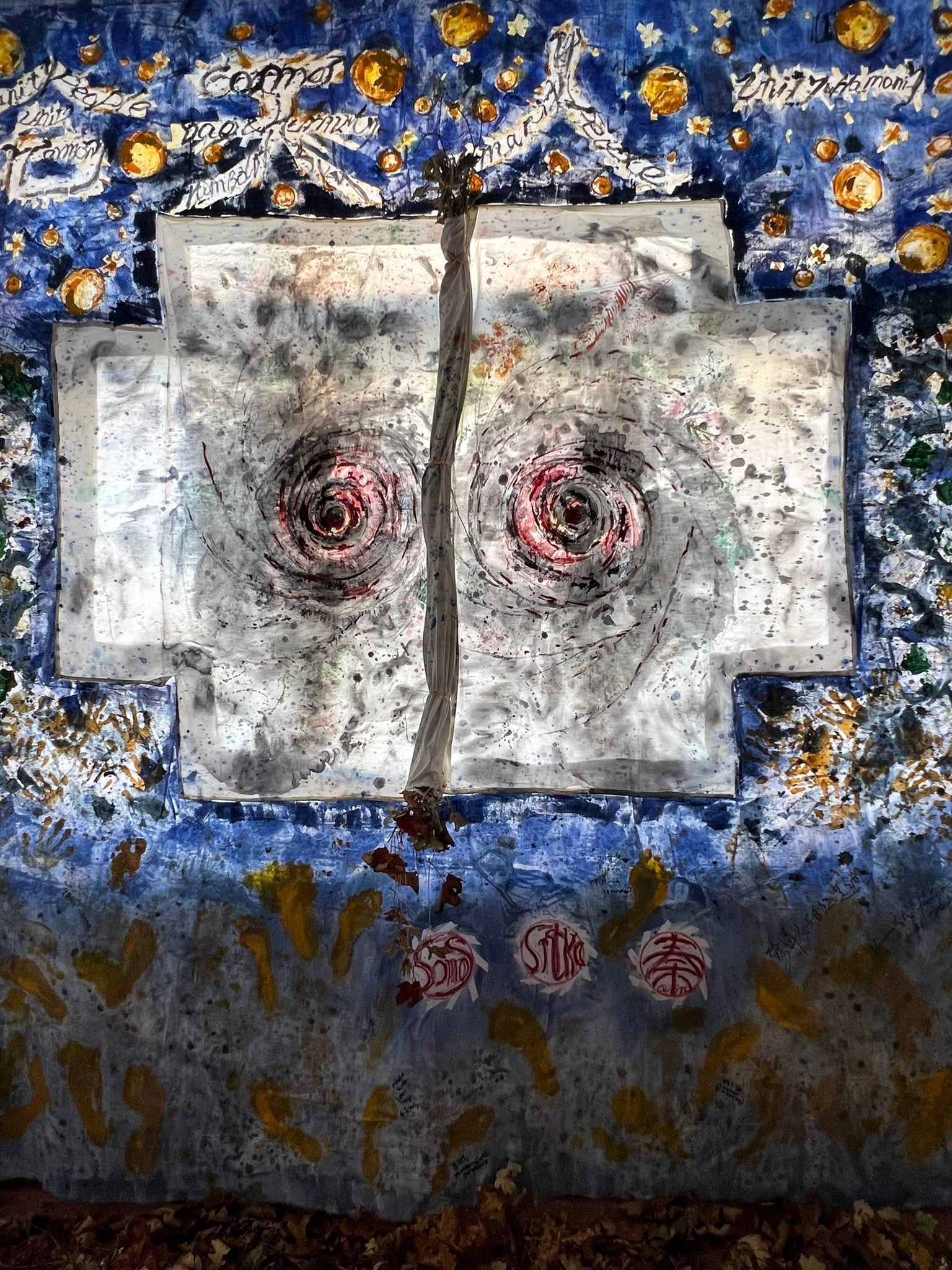 An abstract painting of grays, blues and black