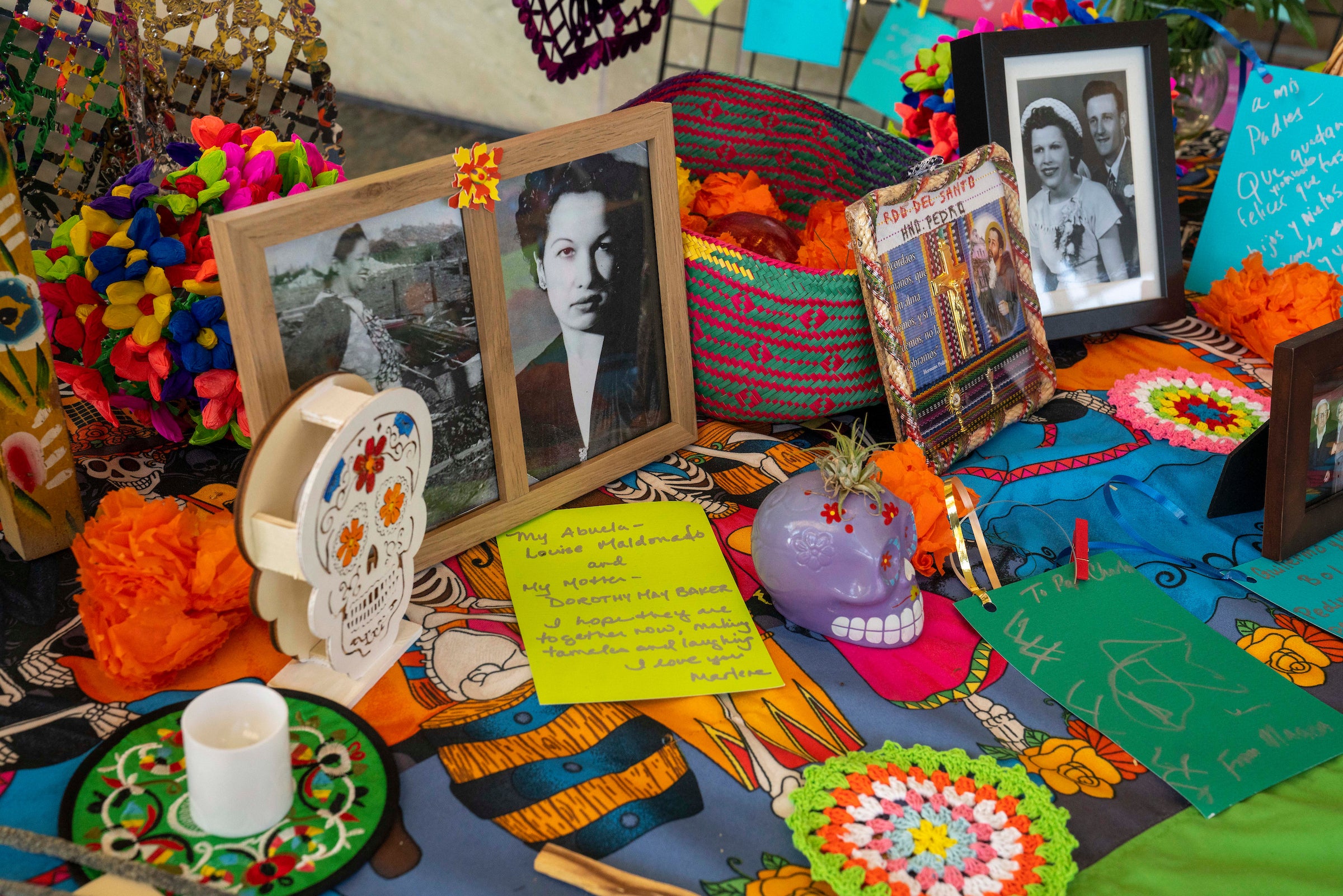 Altar at Mondavi Center with photos, notes and other offerings