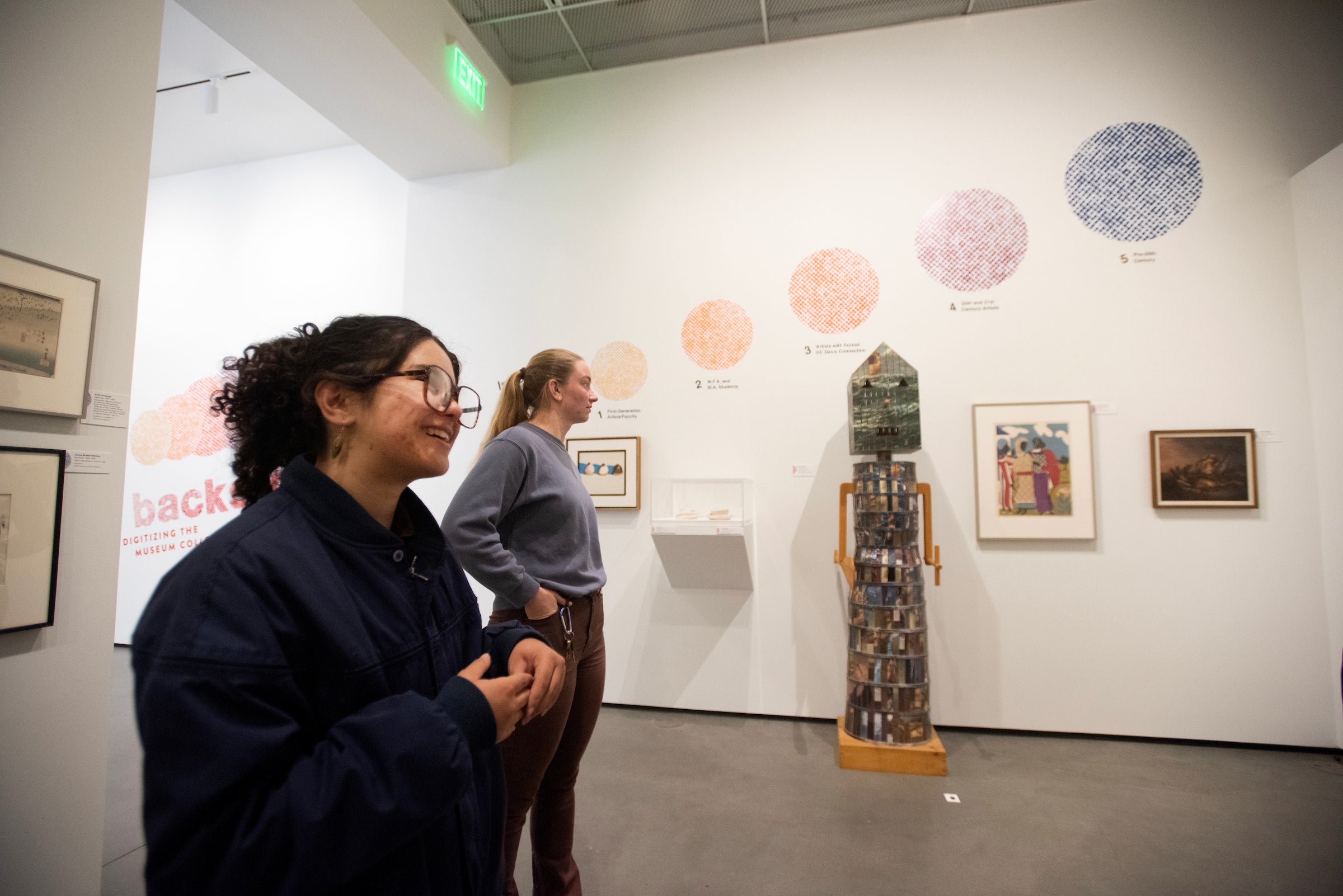 Maggie Mariani, a sociological anthropology major, and Finley, take in the exhibition.