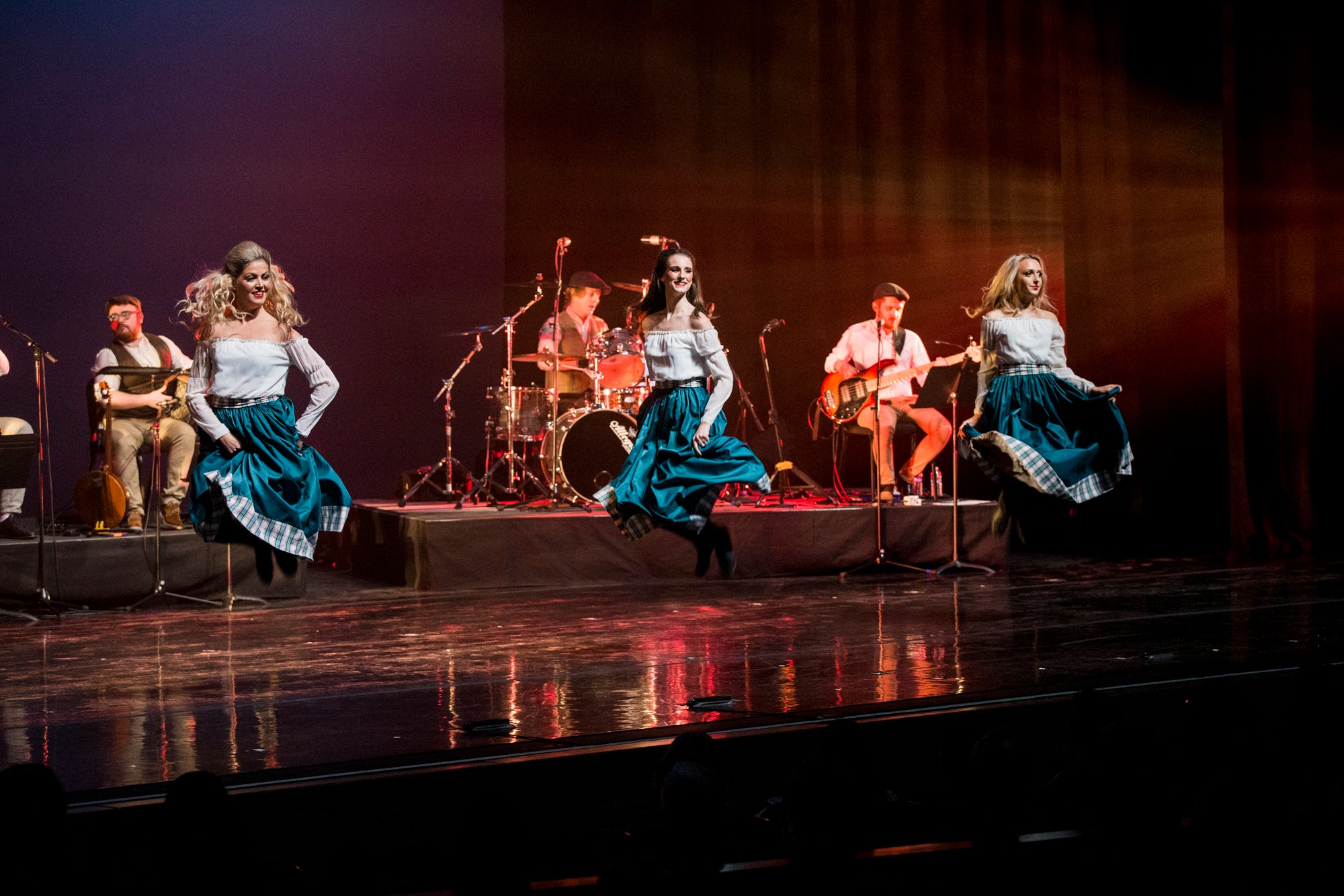 Dancers in traditional costume on stage