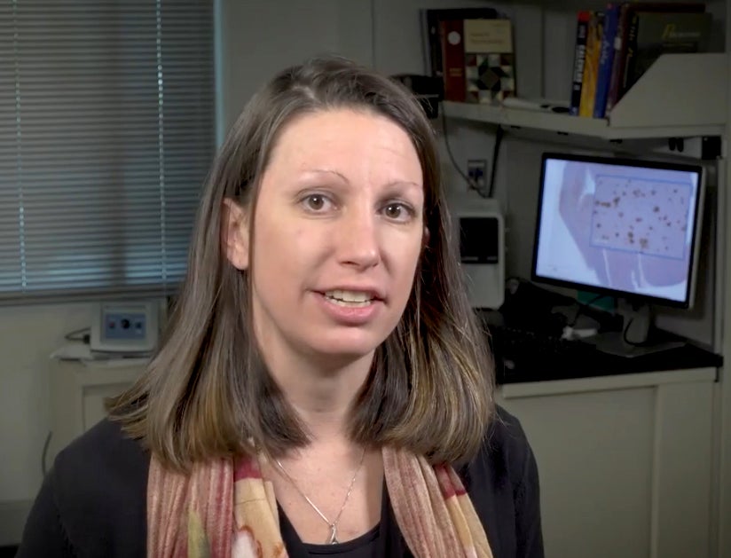 Brittany Dugger sits in her office