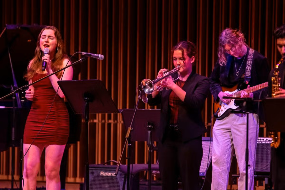 Jazz musicians sing and play instruments