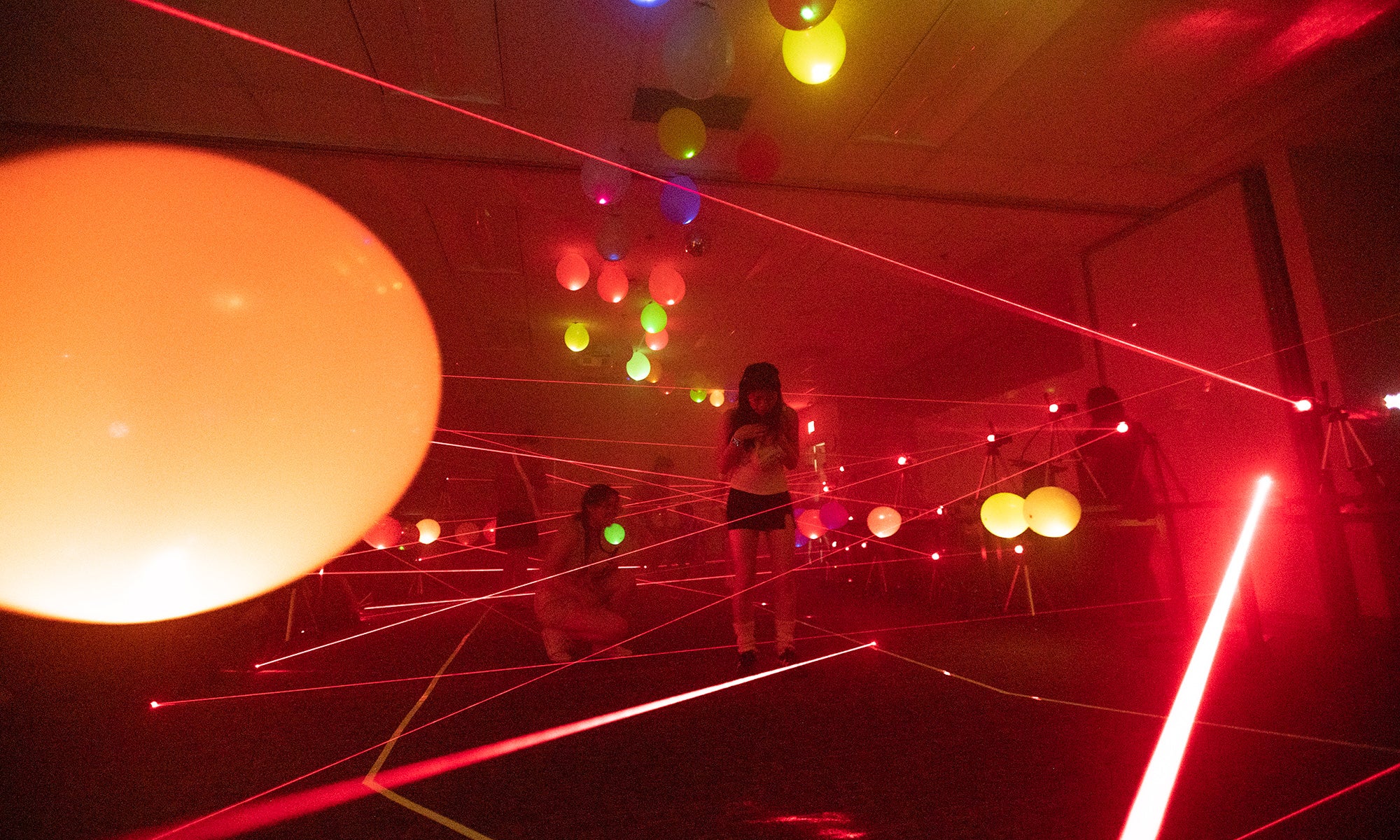 Laser beams create lines of light to form a maze