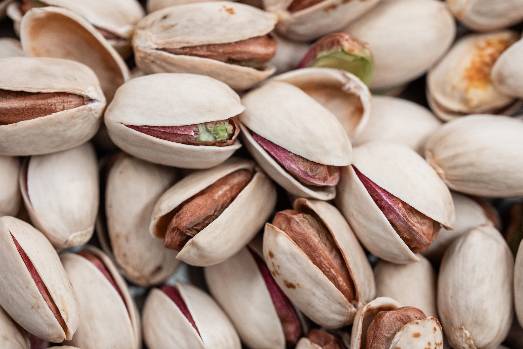 Close up view of a pile of pistachios. Pistachio hulls are the largest byproduct leftover from processing. (Gregory Urquiaga/UC Davis)