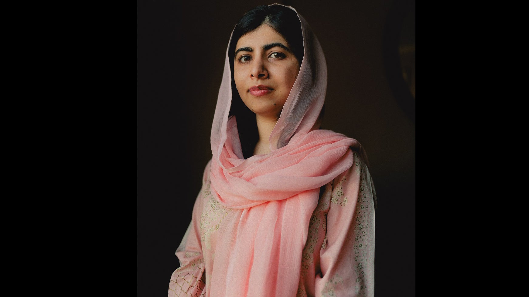 Woman with dark background