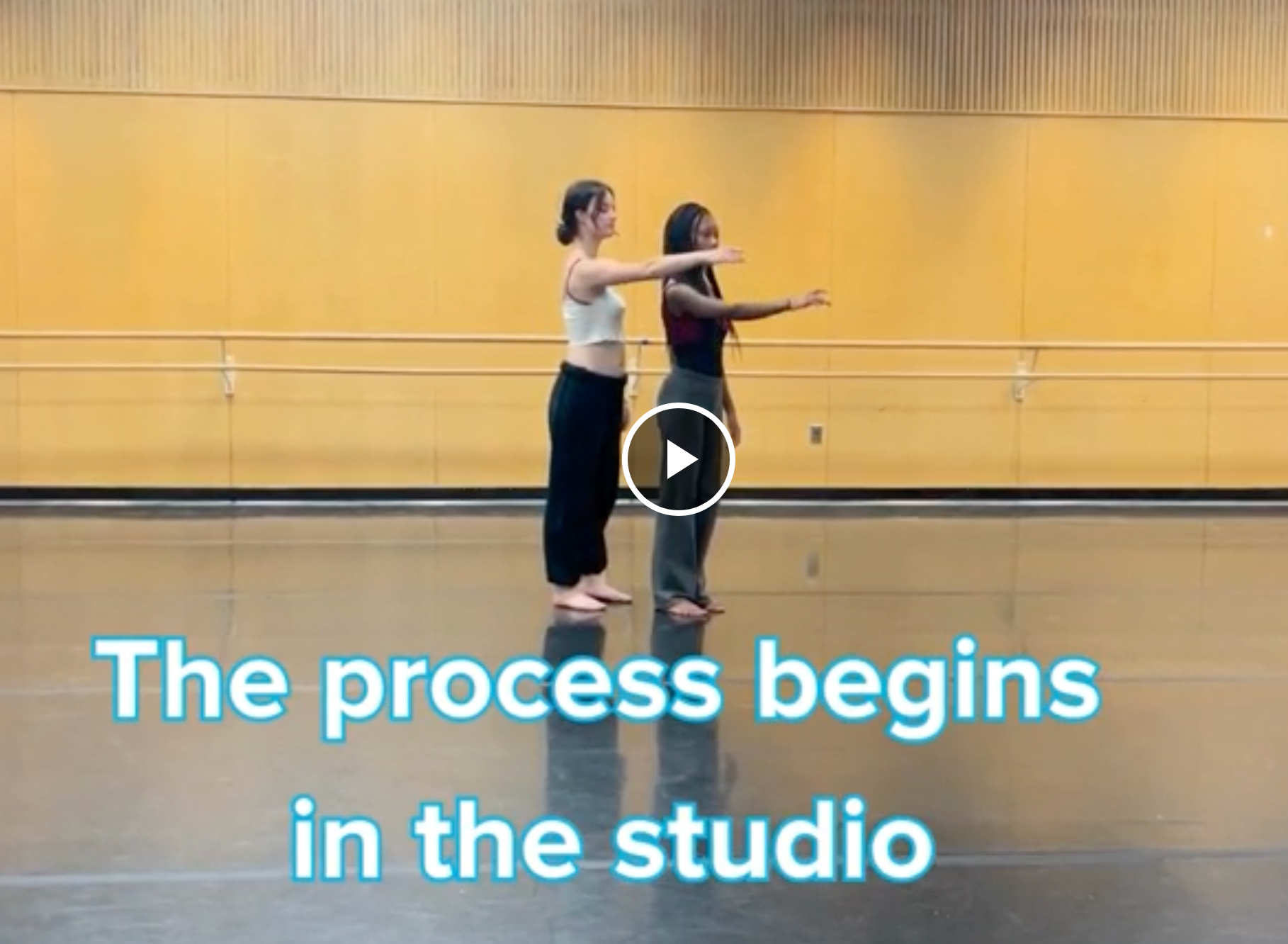 Film still of dancers on stage