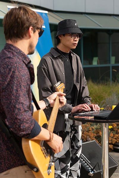 Synth and guitar player