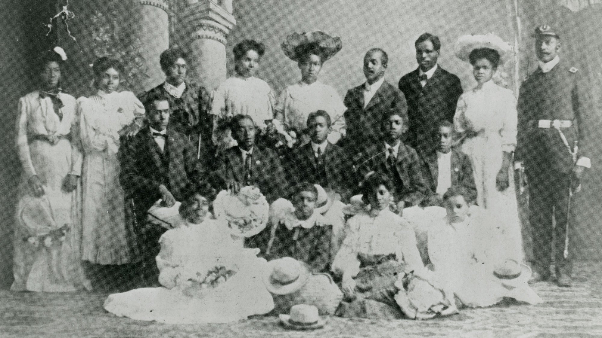 An old photo in black and white shows a group of African American residents who were part of a singing group in Woodland