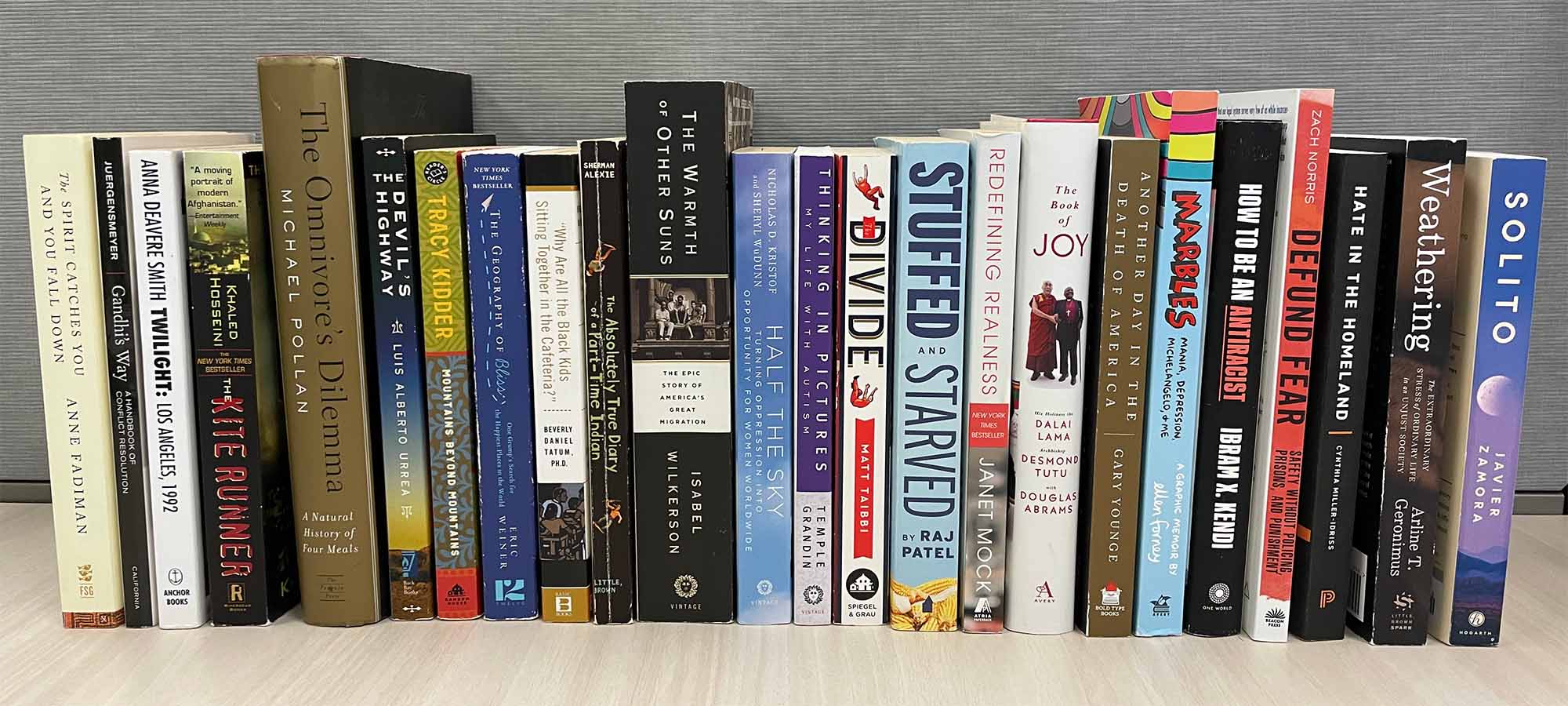 Row of past titles in the Campus Community Book Project.