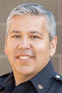 Cess Mercado in fire department uniform