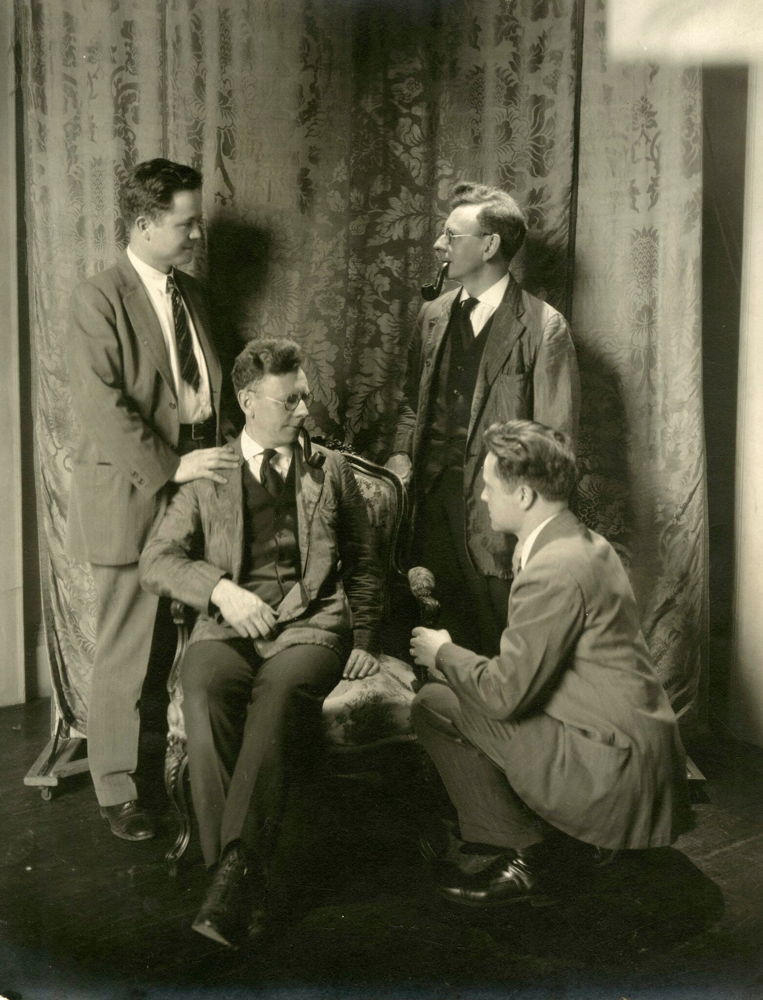 Double exposure of two men interacting