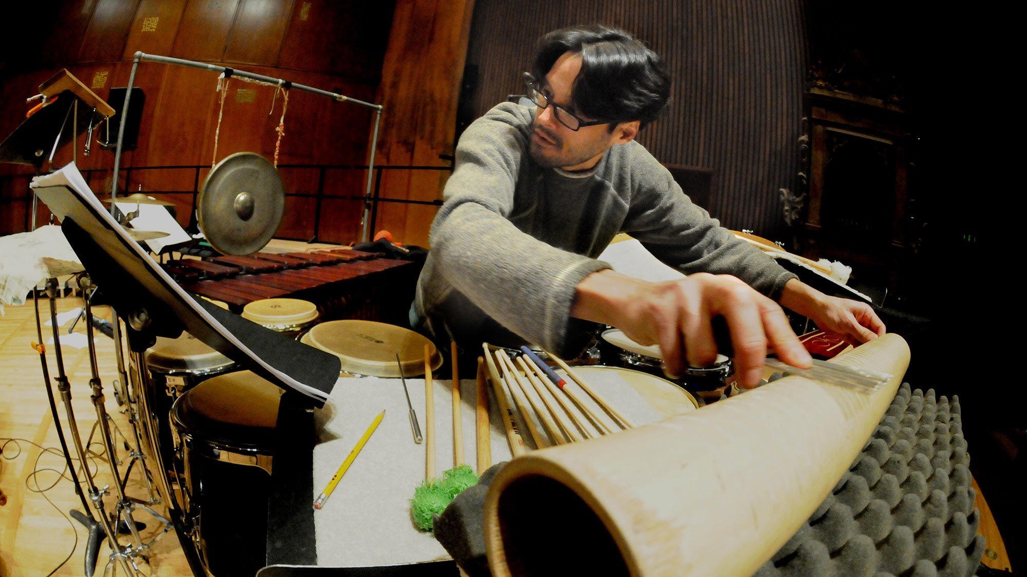 Man plays percussive instrument