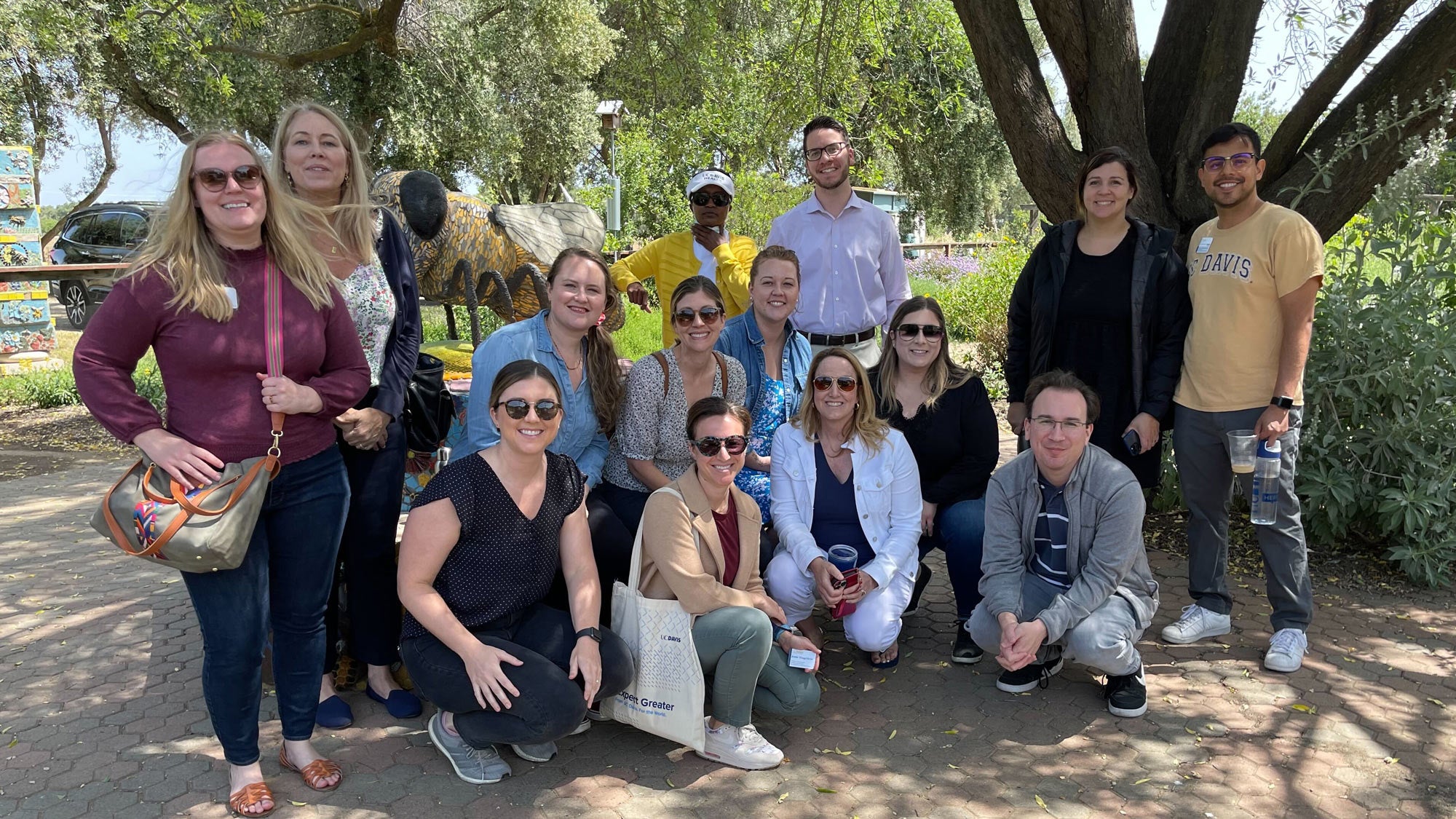Group of employee donors, posing at Bee Haven