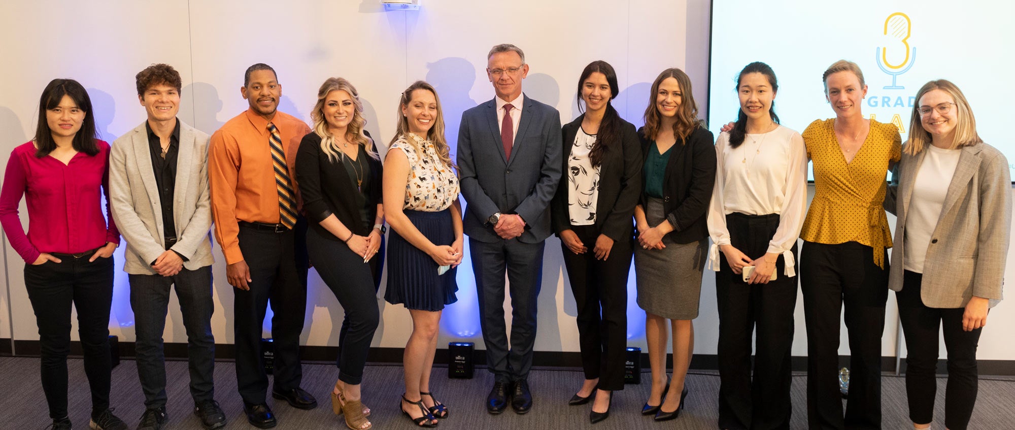 Grad Slam contestants, posed