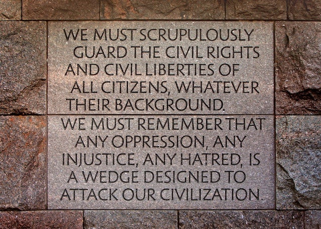 Photo of words carved in granite that say We must scrupulously guard the civil rights of all citizens, whatever their background. We must remember that any oppression, any injustice, any hatred, is a wedge designed to attack our civilization.
