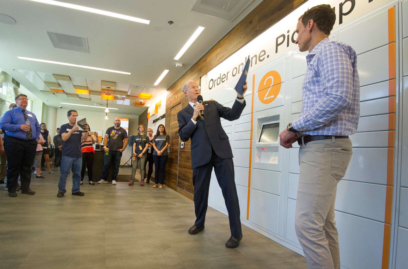 Interim Provost Ken Burtis celebrates the grand opening of Amazon@UC Davis.