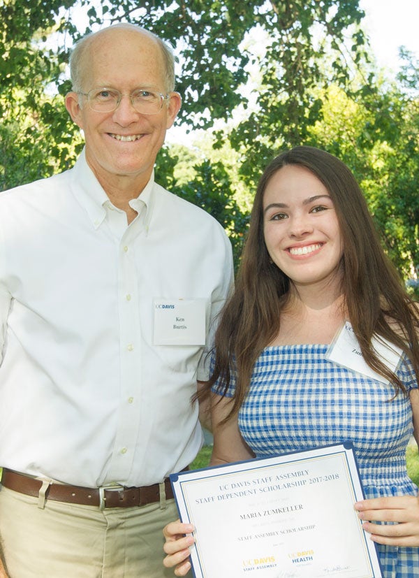 Ken Burtis and Maria Zumkeller, certificate presentation