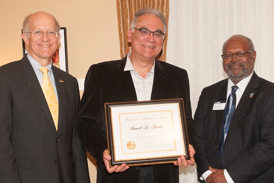 David Acosta flanked by Ken Burtis and Rahim Reed