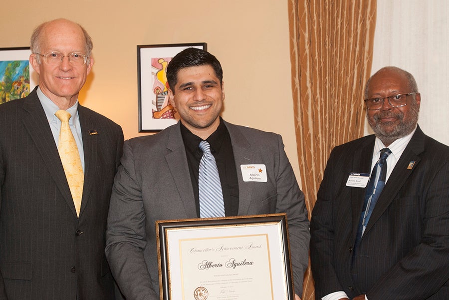 Alberto Aguilera, flanked by Ken Burtis and Rahim Reed