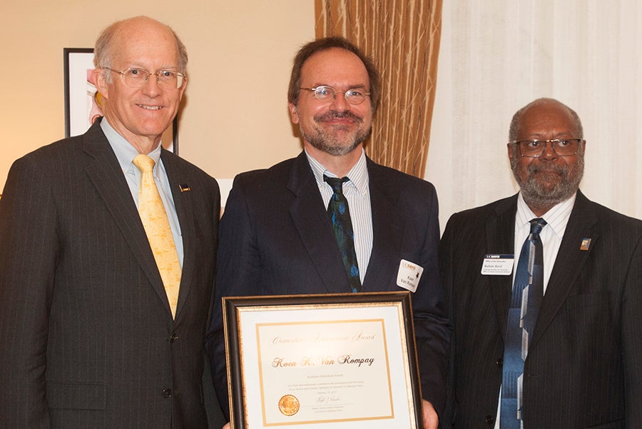 Koen Van Rompay, flanked by Ken Burtis and Rahim Reed