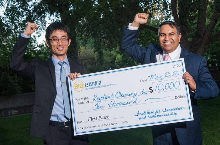 Big Bang! winners with giant check