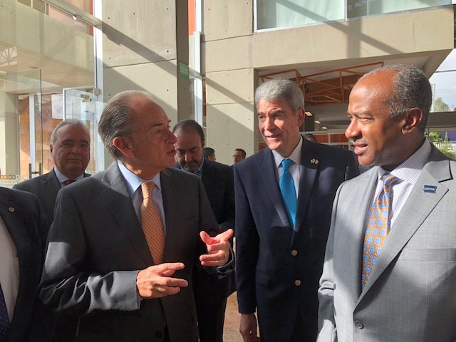 Chancellor Gary S. May speaks to officials in Mexico.