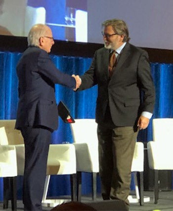 Keith David Watenpaugh receiving an award.