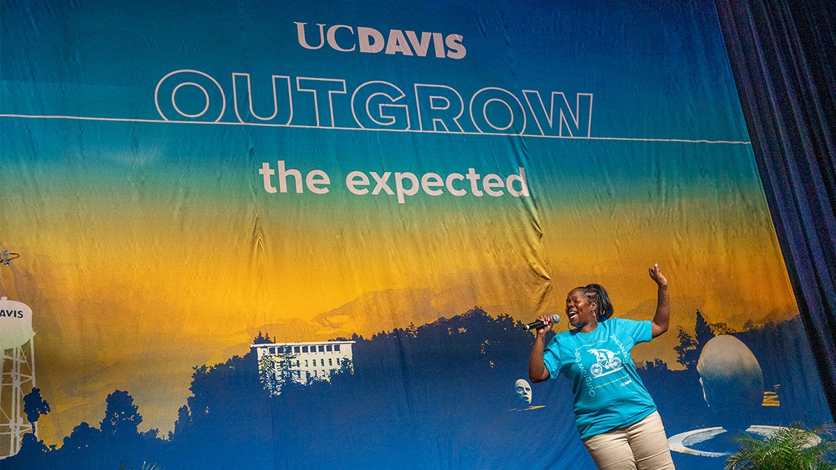 Denisha “Coco Blossom” Bland performs on stage.