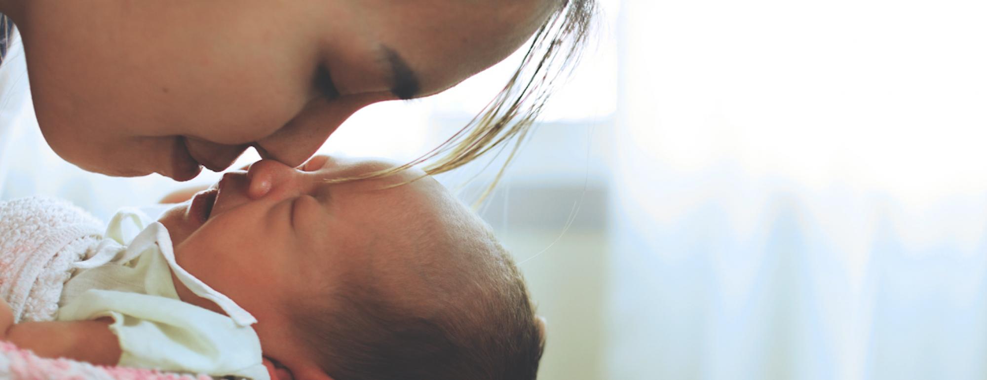 a mother and her newborn baby