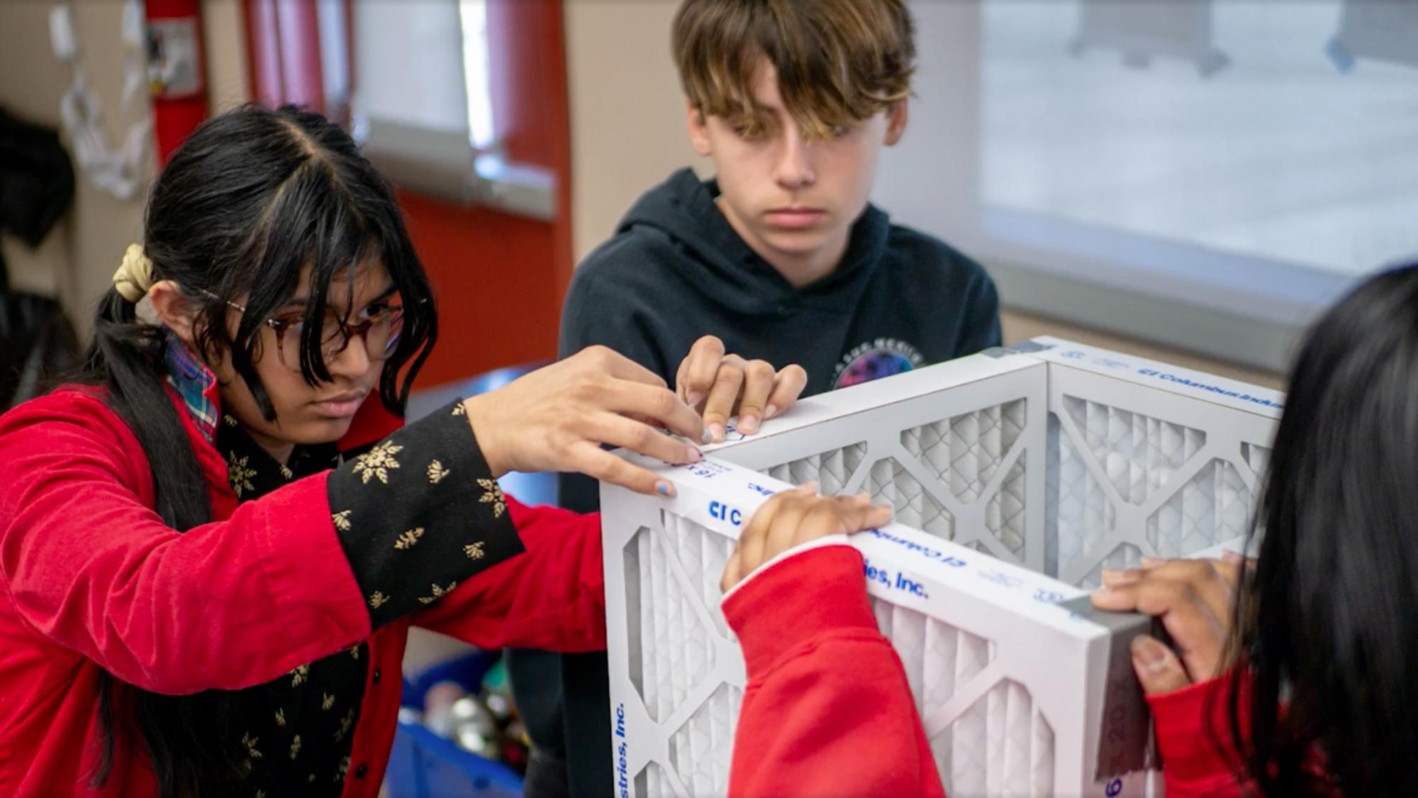 students building a indoor air filter