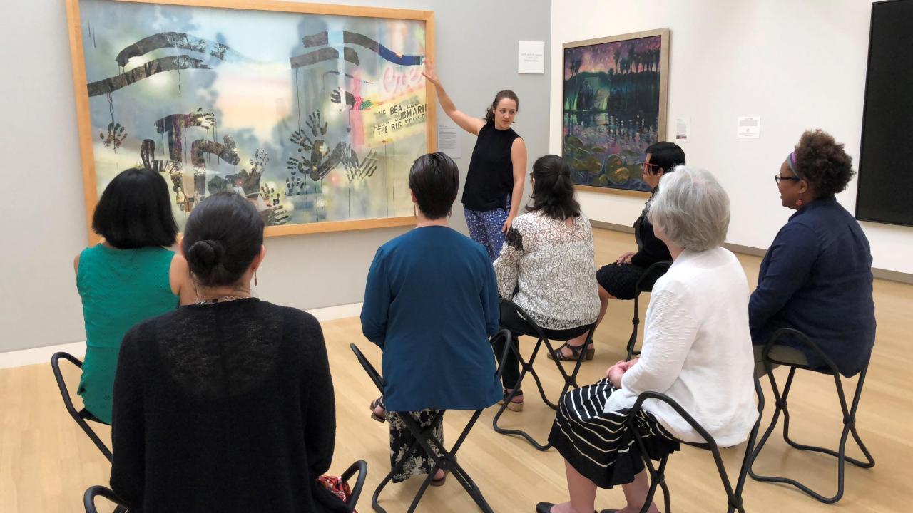 People looking at art