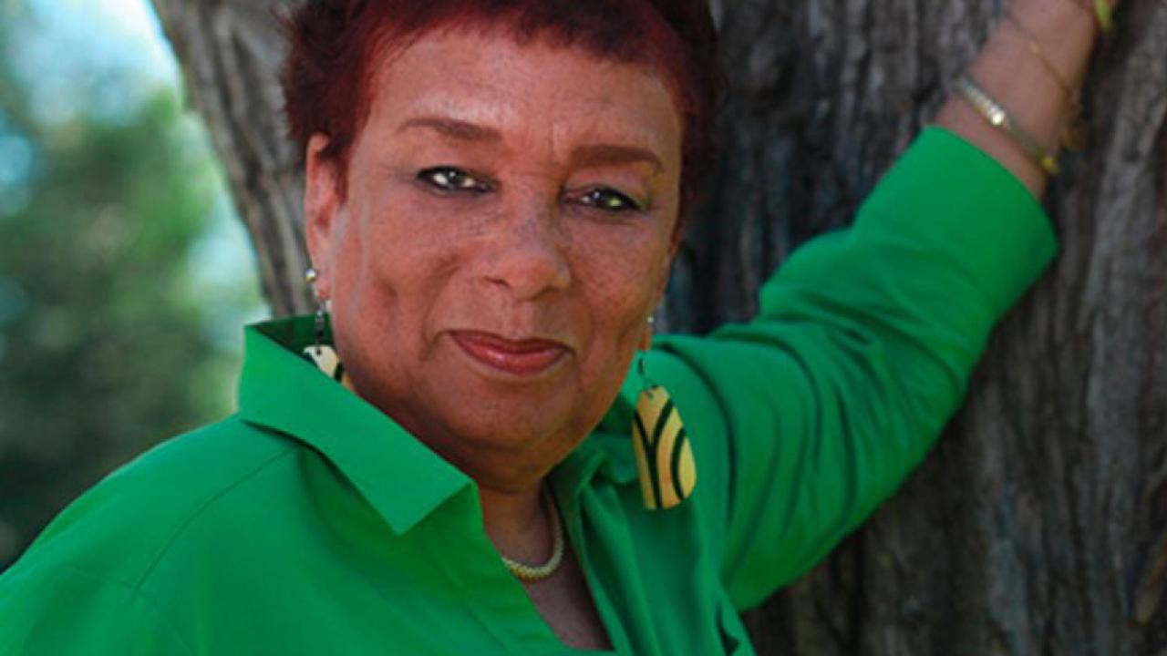 Halifu Osumare, environmental portrait, against tree