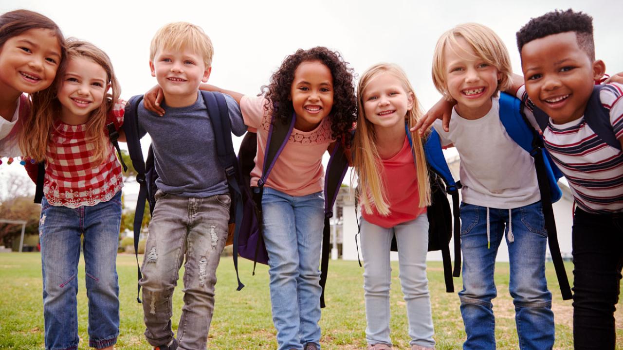 Smiling children in a line
