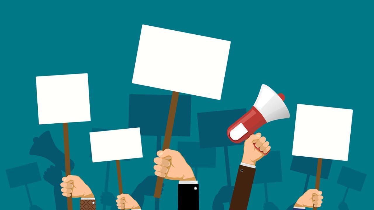 Drawing of union picketers' forearms and hands, holding signs (blank) and a megaphone