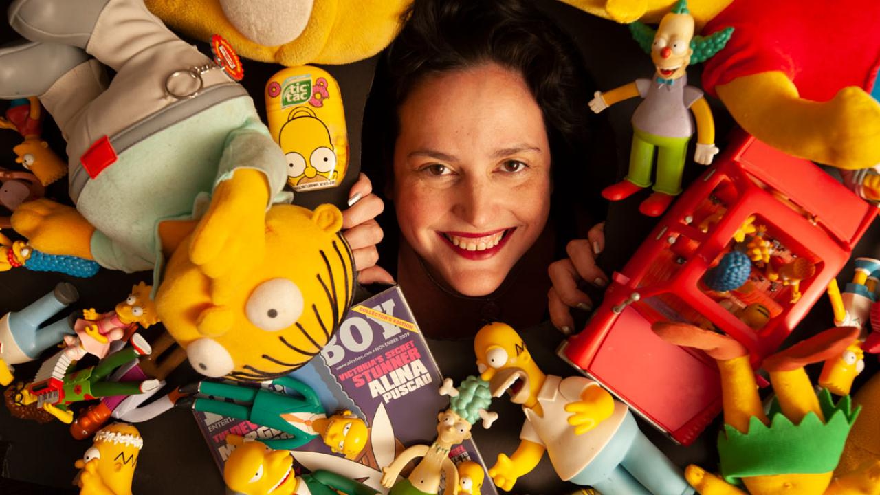 Karma Waltonen, surrounded by "The Simpsons" memorabilia