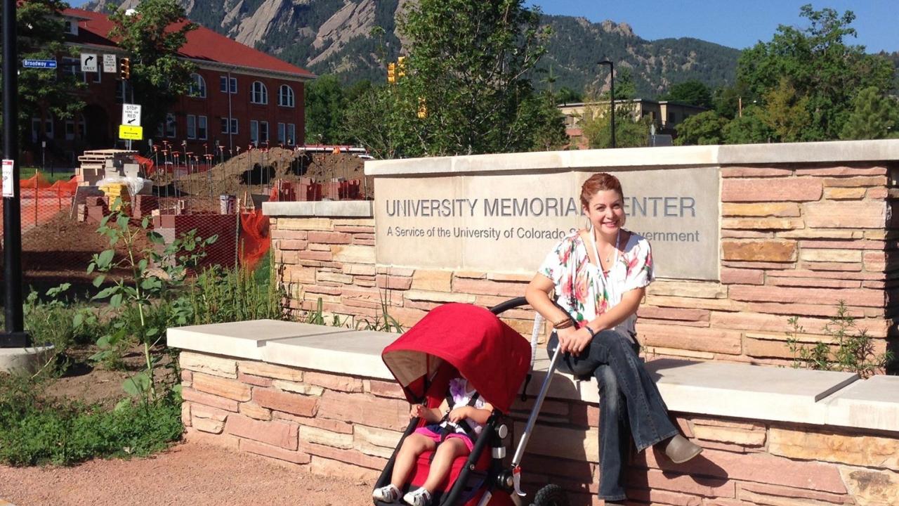 Scientist with child at conference