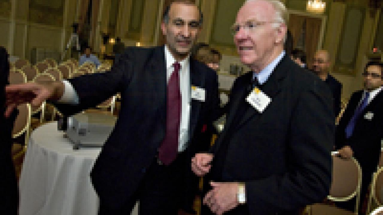 Chancellor Larry Vanderhoef discussed his two trips to Iran before an audience at the Capitol Plaza Ballroom in Sacramento on Dec. 10. Standing with him is Mo Mohanna, an Iranian-born Sacramento businessman and current member of the UC Davis Fou