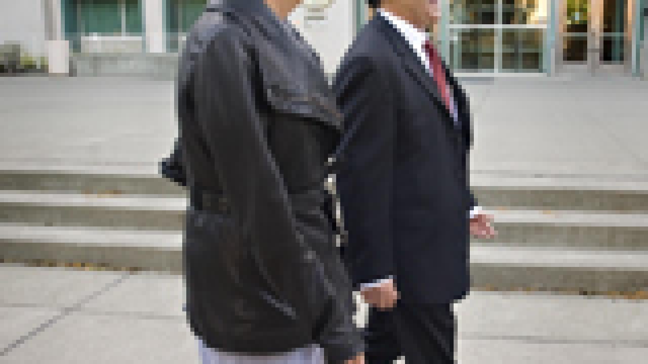 Provost and Executive Vice Chancellor Enrique Lavernia escorts Chancellor-designate Linda Katehi from the Chancellor's Residence to Mrak Hall for their breakfast meeting on May 8.
