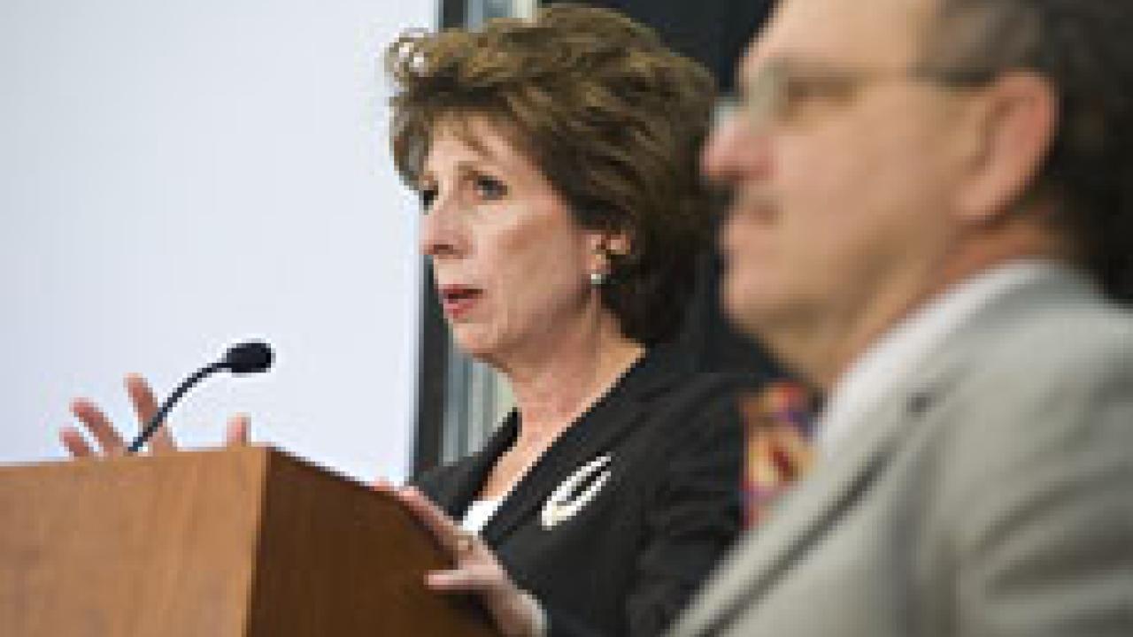 Chancellor Linda Katehi delivers the annual State of the Campus speech. Academic Senate Chair Robert Powell is standing next to her.