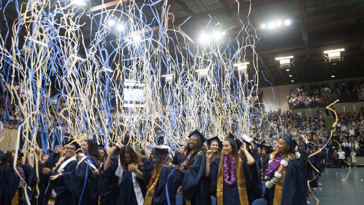 Streamers fall above graduates