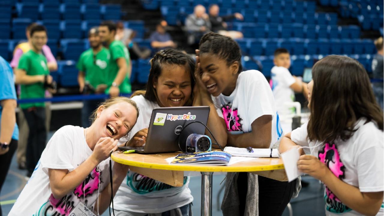 Students having fun with robots at the RoboPlay Competition. 