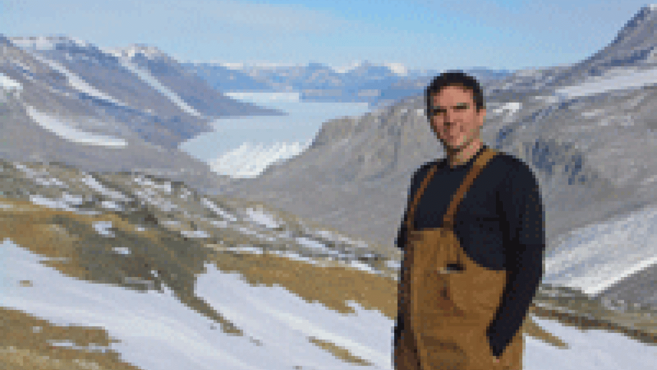 Gary Acton in November 2007 with the Taylor Glacier in the background and with the Antarctic ice sheet in the far distant background.