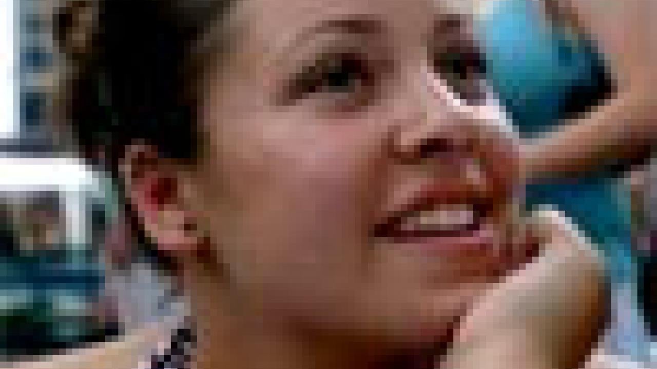 photo: woman with hand on chin