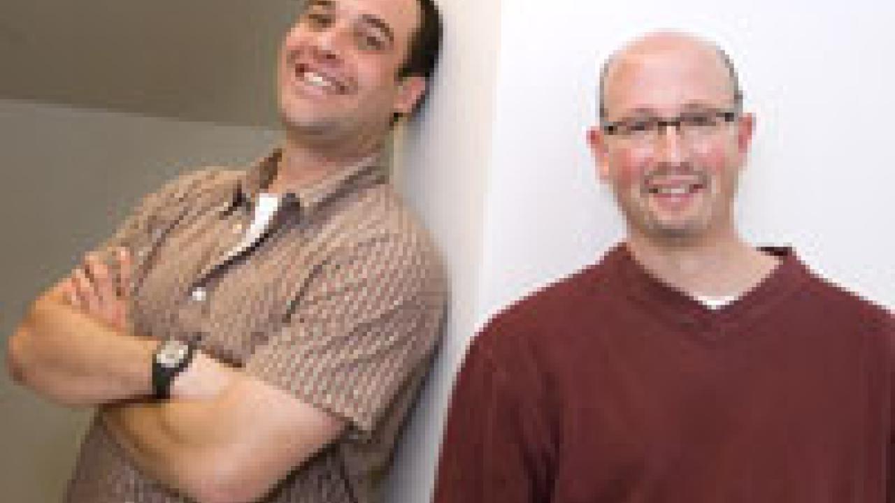 Ari Kelman and Ari Kelman stand outside Ari Kelman&rsquo;s office. Huh? Yes, it is true. Ari Y. Kelman, an assistant professor of American studies, is on the left, and Ari &lsquo;no middle initial&rsquo; Kelman, an associate professor of history, is on the 
