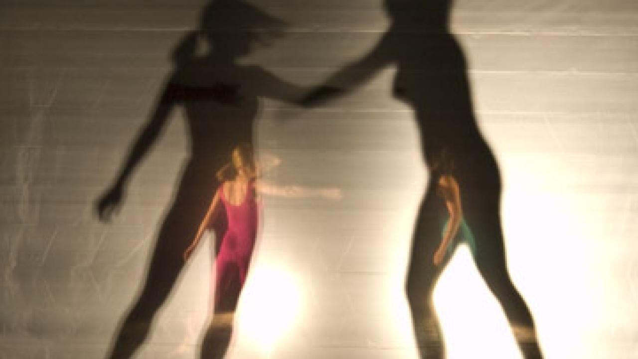 UC Davis students Anne Reeder and Jenna Chen perform in John Jasperse's Beyond Belief, a new work that alternates between constructing and deconstruct