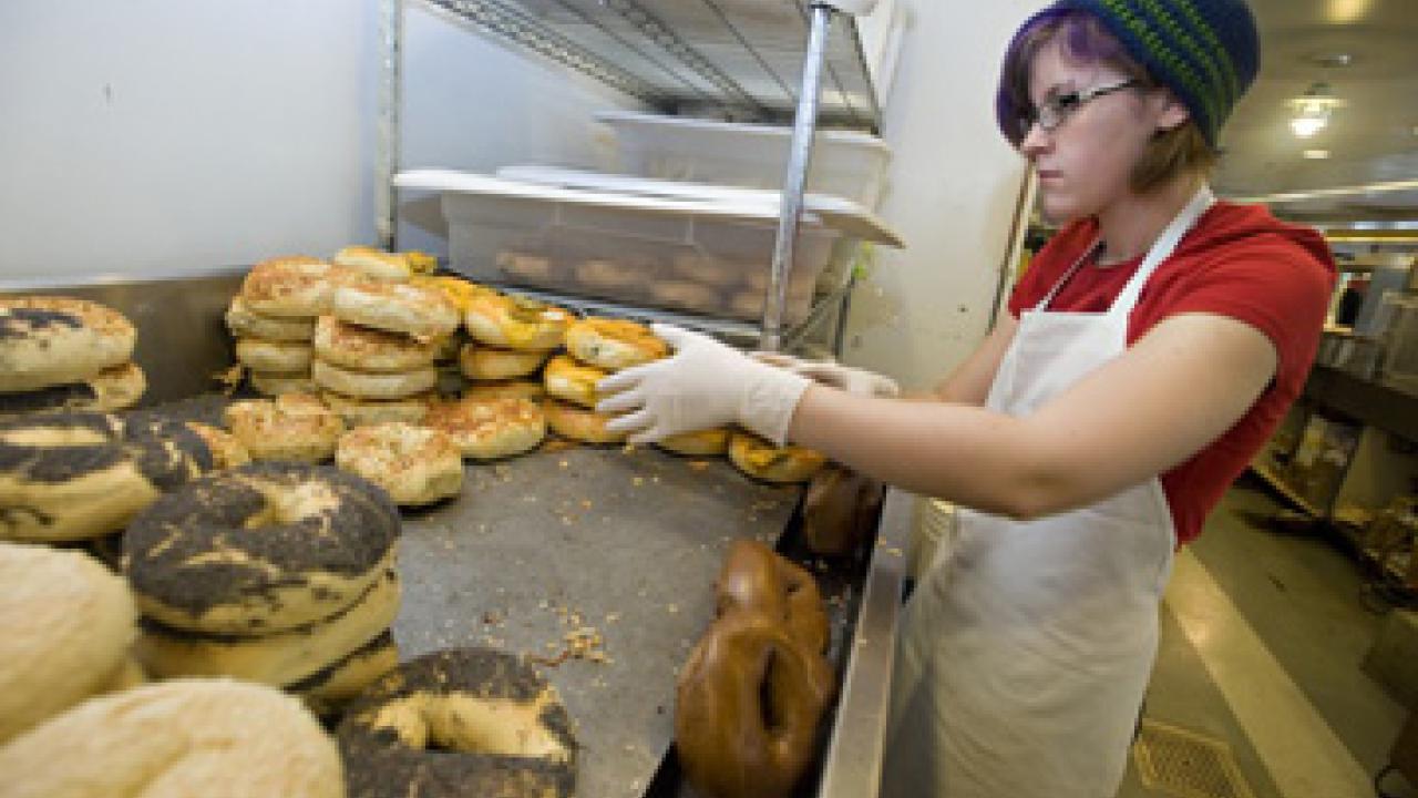 Student employee Jackelyn Smith, works a recent lunch shift at the Coffee House's bagel station.