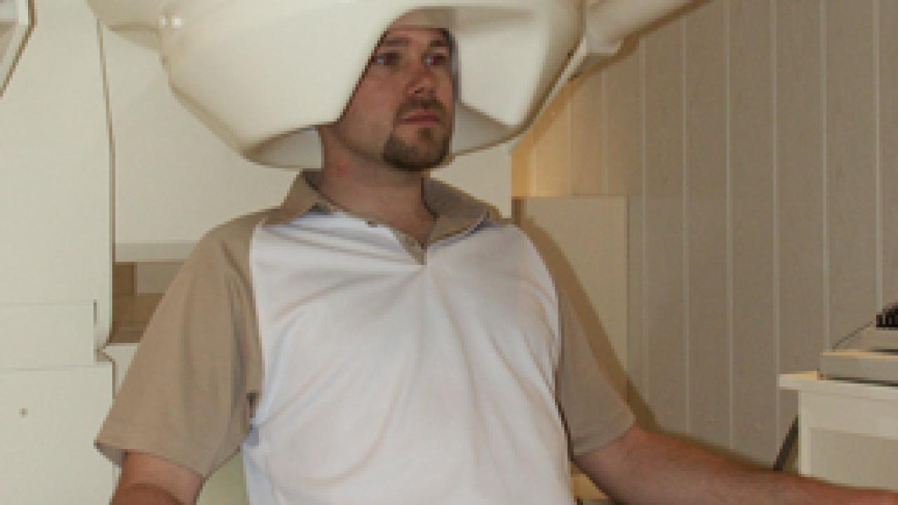 Neuroscientist Ole Jensen in the MEG machine.